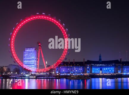 London Eye-Rad auf Themse bei Nacht Stockfoto