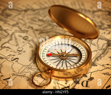 Goldene Kompass auf der Karte Stockfoto