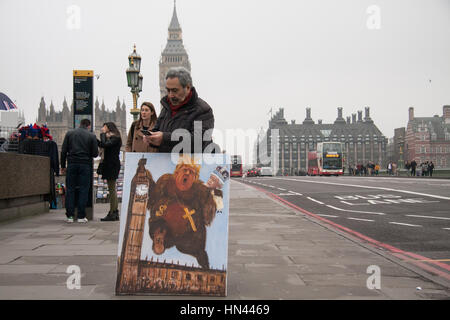 London, UK. 8. Februar 2017. Politischer Satiriker Kaya Mar hält ein Gemälde auf Westminster Bridge als britische Abgeordnete des Parlaments für eine endgültige Abstimmung über den Gesetzentwurf Austritt auf das House Of Commons Guthaben festgelegt: Amer Ghazzal/Alamy Live-Nachrichten Stockfoto