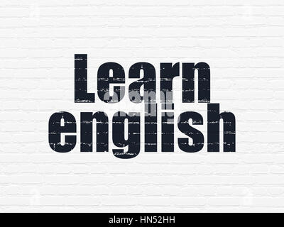 Studium Konzept: lackiert Schwarz Text lernen Englisch auf weißen Stein Wand Hintergrund Stockfoto