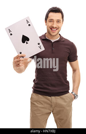 Glücklicher Kerl mit einem as Pik-Karte isoliert auf weißem Hintergrund Stockfoto