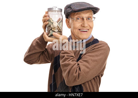 Freudige älterer Mann hielt ein Glas mit Geld isoliert auf weißem Hintergrund Stockfoto