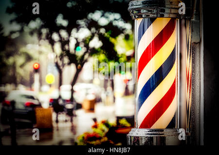 Regen sammeln auf dem Barber Shop Pol auf Insel Barbiere in Coronado, Kalifornien. Stockfoto