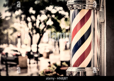 Regen sammeln auf dem Barber Shop Pol auf Insel Barbiere in Coronado, Kalifornien. Stockfoto