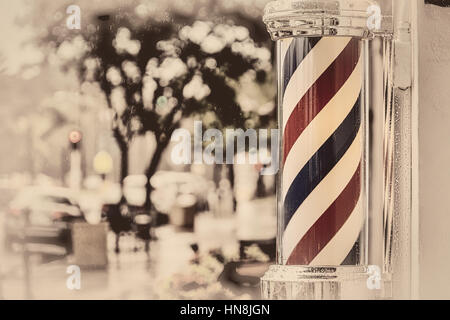 Regen sammeln auf dem Barber Shop Pol auf Insel Barbiere in Coronado, Kalifornien. Stockfoto