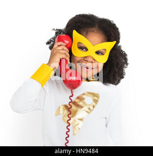 Superhelden-Mädchen mit Telefon-Konzept Stockfoto