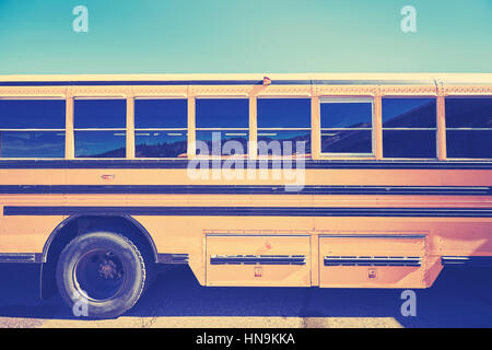 Stilisierte Retro Nahaufnahme Bild von einem Schulbus-Seite. Stockfoto