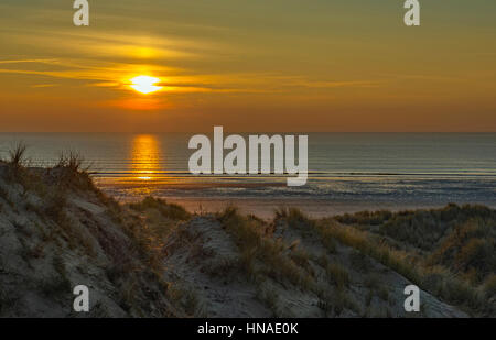 Sonnenuntergang über Rhossili Strand Gower Südwales Stockfoto