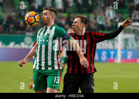 Budapest, Ungarn. 11. Februar 2017. BUDAPEST, Ungarn - 11 Februar: Daniel Bode #13 Ferencvarosi TC konkurriert für den Ball mit Ivan Lovric (R) Honved von Budapest in den ungarischen Pokal-Runde der 16 erste Bein Match zwischen Ferencvarosi TC und Budapest Honved Groupama Arena am 11. Februar 2017 in Budapest, Ungarn. Bildnachweis: Laszlo Szirtesi/Alamy Live-Nachrichten Stockfoto