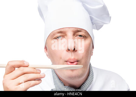 Horizontale close-up Portrait eines Kochs mit einem Holzlöffel Stockfoto