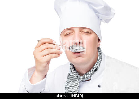 Koch, Verkostung der Suppe Nahaufnahme Gesicht auf weißem Hintergrund Stockfoto