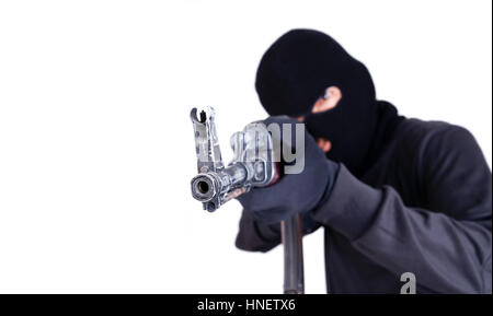 Terrorist mit Maschinengewehr ak47 isoliert auf weißem Hintergrund Stockfoto