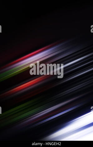 Abstrakte digitale unscharfen Hintergrund mit leuchtenden bunten Linien Muster auf schwarz Stockfoto