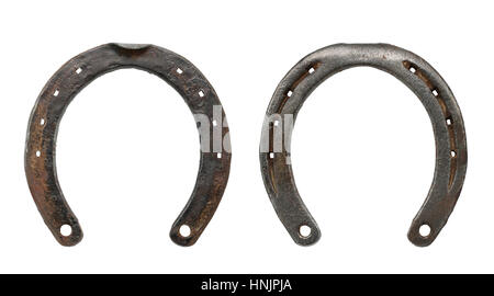 Alte rostige Hufeisen isoliert auf weißem Hintergrund. Symbol für Glück Konzept. Stockfoto