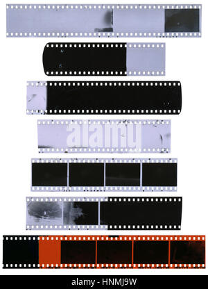 Alte, gebrauchte, staubig und zerkratzte Zelluloid Filmstreifen isoliert auf weißem Hintergrund Stockfoto