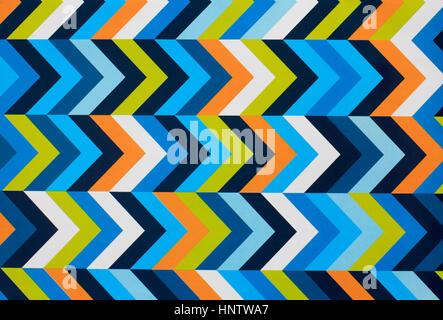 blau orange gelb gestreiften farbigem Geschenkpapier Stockfoto