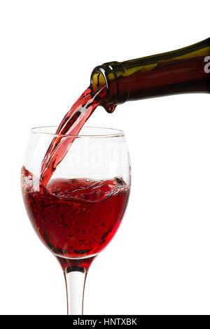 Flaschenfüllung das Glas Wein. Spritzer Wein Stockfoto