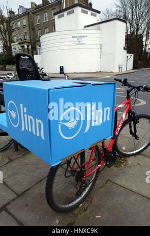 Dschinn Essen Hauslieferung Kurier Service Fahrrad, London Stockfoto