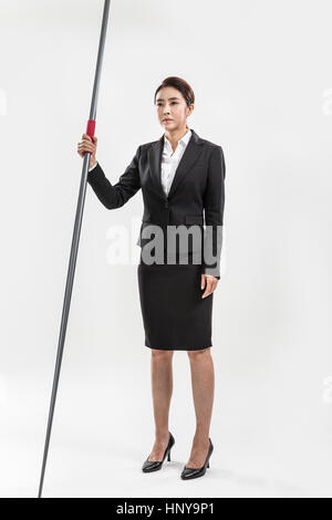 Geschäftsfrau mit Speer Stockfoto