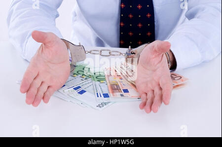 Model Release, Geschaeftsmann in Handschellen, Symbolbild Wirtschaftskriminalitaet - Business-Mann in Handschellen Stockfoto