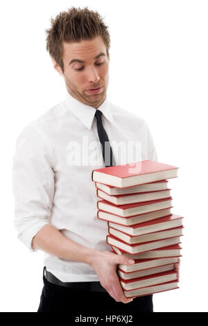 Junger Mann, 25 +, Mit Hemd Und Krawatte Haelt Stapel Buecher in der Hand - junger Mann mit Stapel Bücher in Händen Stockfoto