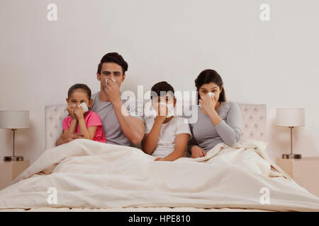 Familie Kälte leidet Stockfoto