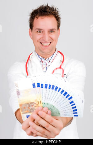 Model Release, Arzt Mit Geld - Arzt mit Geld Stockfoto