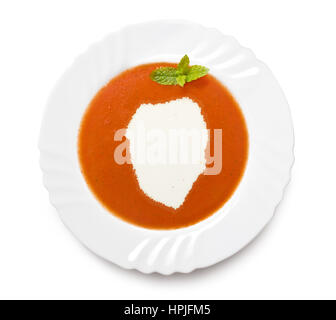 Ein Teller Tomatensuppe mit Sahne in der Form von Sierra Leone. (Serie) Stockfoto