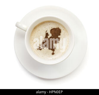 Eine Tasse Kaffee mit Schaum und Pulver in Form von Niederlande. (Serie) Stockfoto