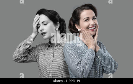 1950er Jahre Stil Frau Ausdruck von Schwäche in Vitalität ändern Stockfoto