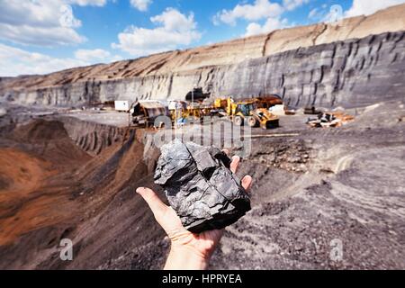 Zeche - Kohle auf der Handfläche Stockfoto