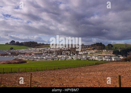 Wohnwagen und Ferienhäuser an der Ladram Bucht, einen Ferienpark in East Devon, UK. Stockfoto