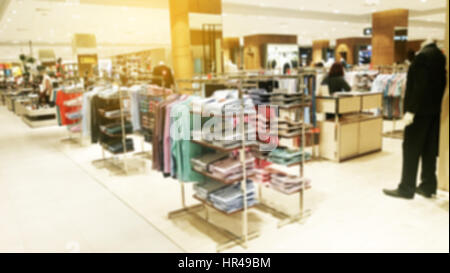 Abstrakte verschwommenes Foto von Bekleidungsgeschäft in einer Shopping Mall, shopping Konzept Stockfoto