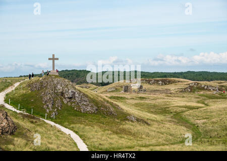 St Dwynwen Kreuz, Llanddwyn Island in Anglesey, Nordwales Stockfoto