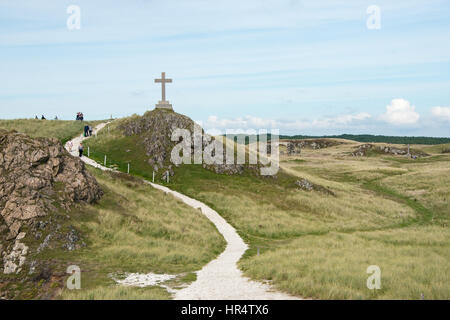 St Dwynwen Kreuz, Llanddwyn Island in Anglesey, Nordwales Stockfoto