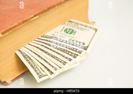 Hundert-Dollar-Scheine in Buch Stockfoto