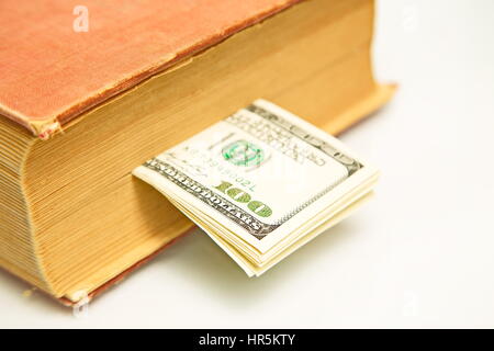 Hundert-Dollar-Scheine in Buch Stockfoto