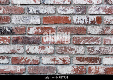 Verwitterte rote Backsteinmauer Hintergrund Stockfoto
