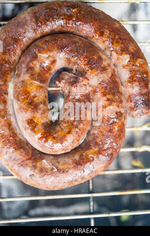 Boerewors Kochen auf einem Barai in Simbabwe. Stockfoto