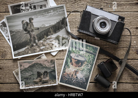 Fotografie-Konzept mit alten Kamera und Fotos Stockfoto