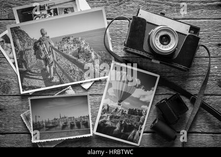 Fotografie-Konzept mit alten Kamera und Fotos Stockfoto