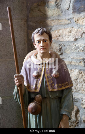 Statue eines Pilgers Rückkehr aus den Jakobsweg und Schrein des Apostels in Santiago De Compostela in Galicien, Spanien.  Die Skulptur befindet sich in der Stockfoto