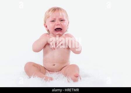 schreiendes Baby in Windeln Stockfoto