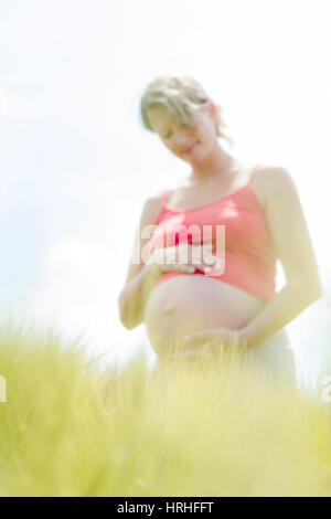 Schwangere Frau - schwangere Frau Stockfoto