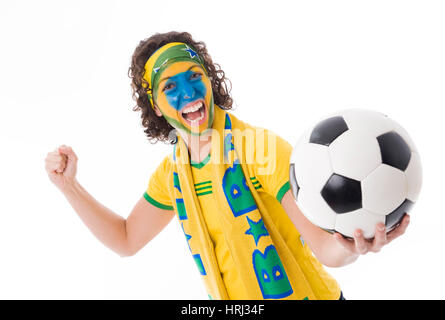 Englische Fußball-Fan, weiblichem Brasilianischer Fussballfan weitergeleitet Schlagzeuggeschäft Stockfoto