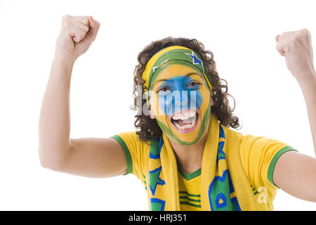 Englische Fußball-Fan, weiblichem Brasilianischer Fussballfan weitergeleitet Schlagzeuggeschäft Stockfoto