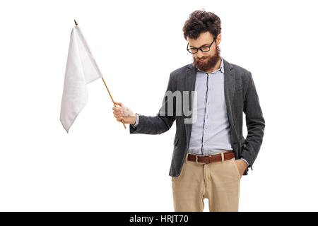 Mann mit dem Kopf nach unten hält eine weiße Fahne isoliert auf weißem Hintergrund Stockfoto