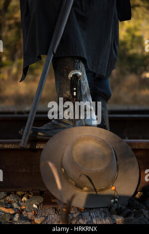 Stock Bild von einem Cowboy hält eine Gewehr Stockfoto