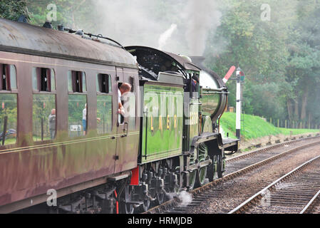 Dampflok auf der North Norfolk - Mohn Bahnstrecke am Weybourne Bahnhof Stockfoto