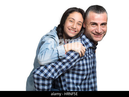 Vater stehen und Mädchen auf seinem Rücken zu tragen Stockfoto